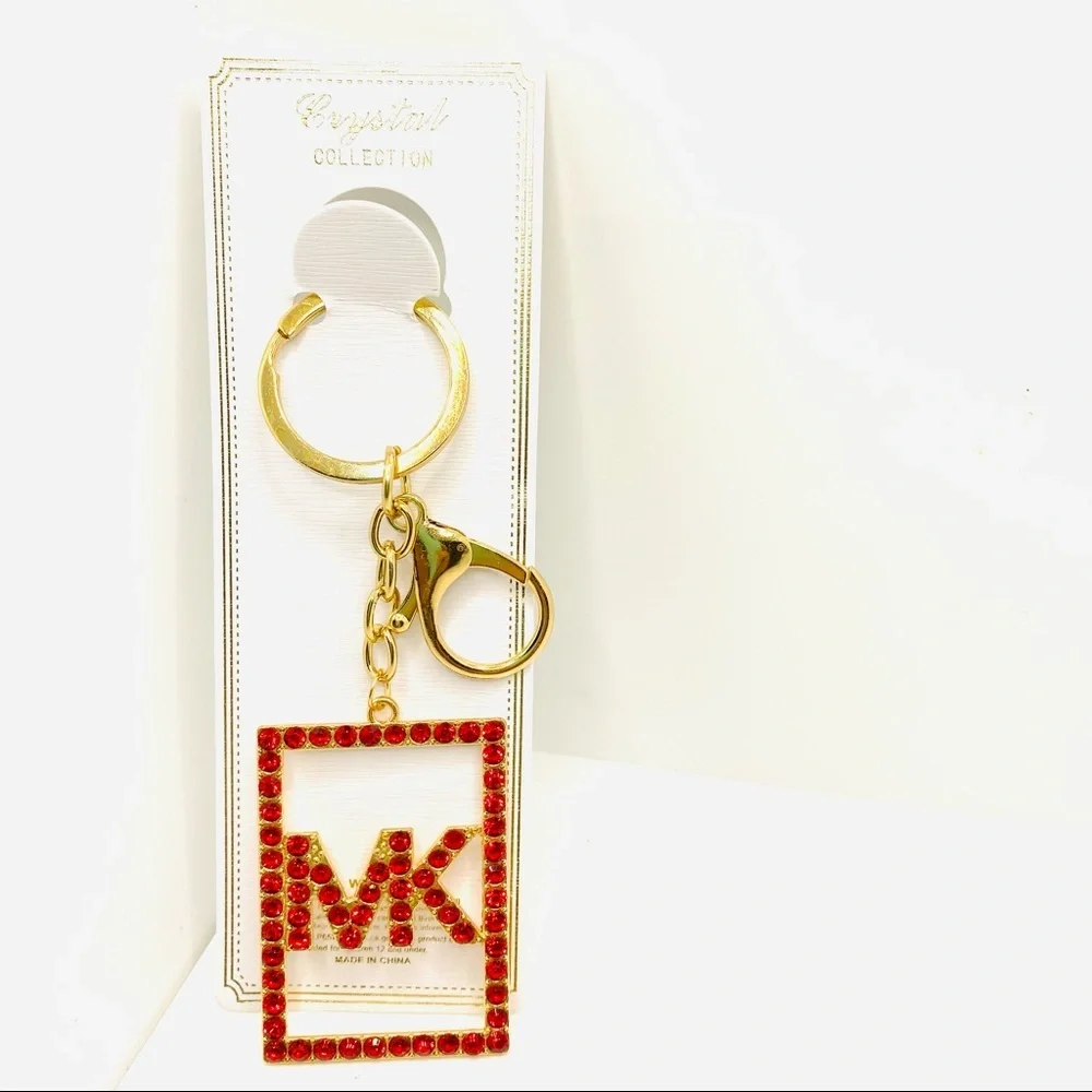 Purse Charm Key Chain MK in Red Crystals set in golden tone.